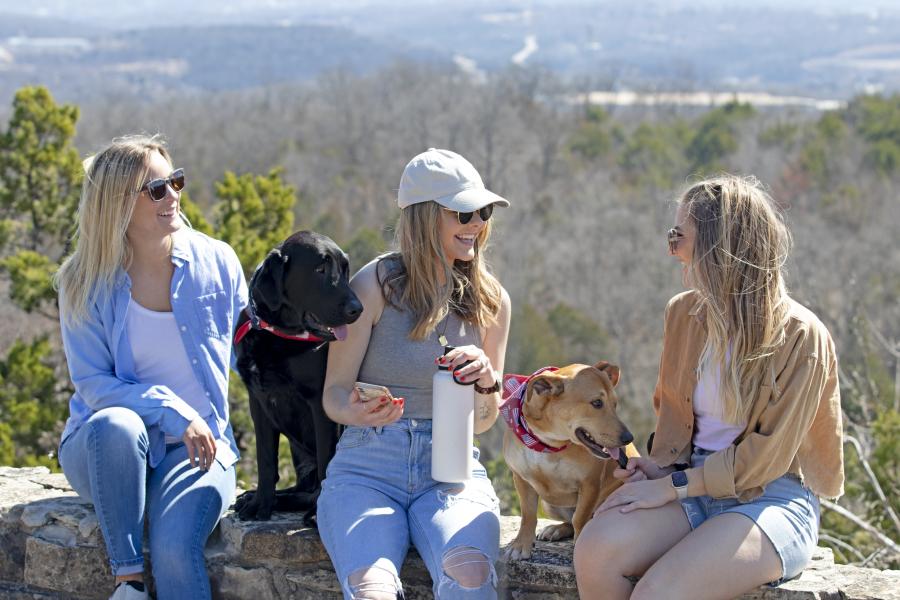 group of girls with dogs in branson