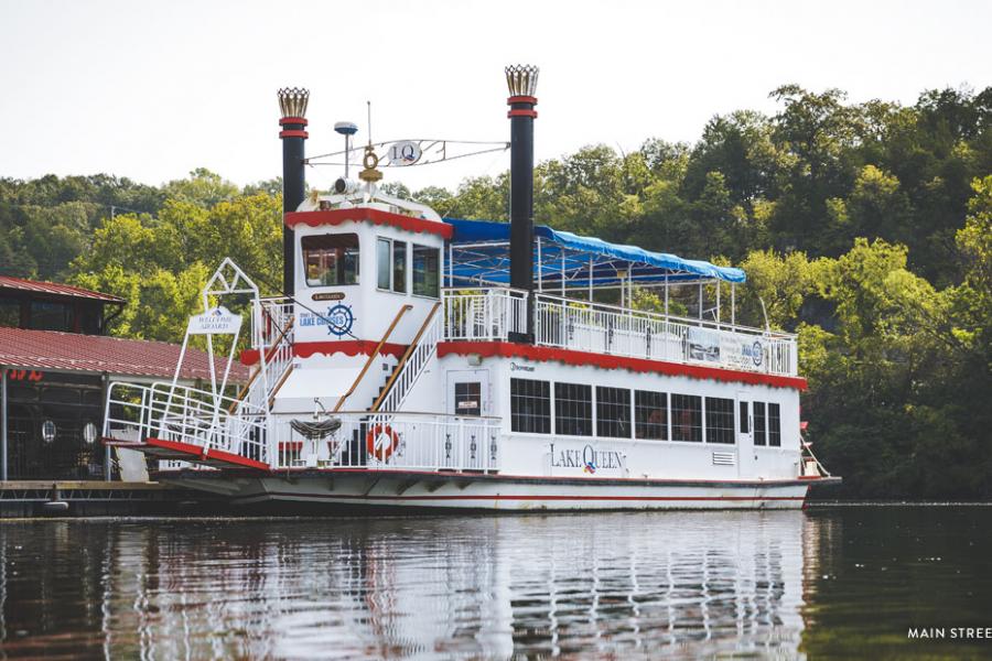 Large Lake Queen Boat sitting on Lake Taneycomo near Branson Landing.