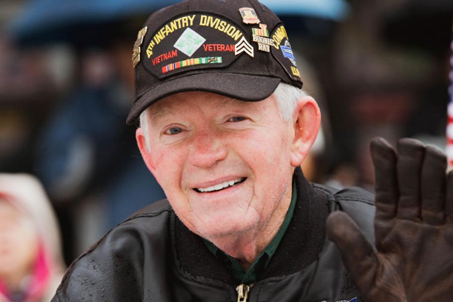 United States Veteran riding on a float in Branson's annual Veterans Day Parade. 