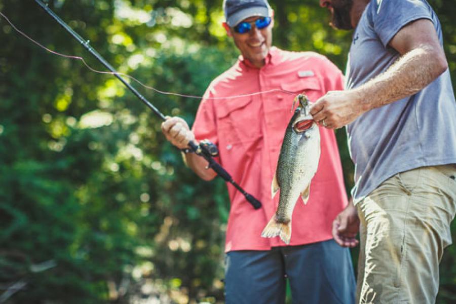 Two men bass fishing on Table Rock Lake in Branson.