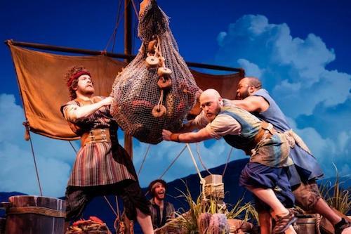 Actors playing out scene on a boat in Jesus Show.