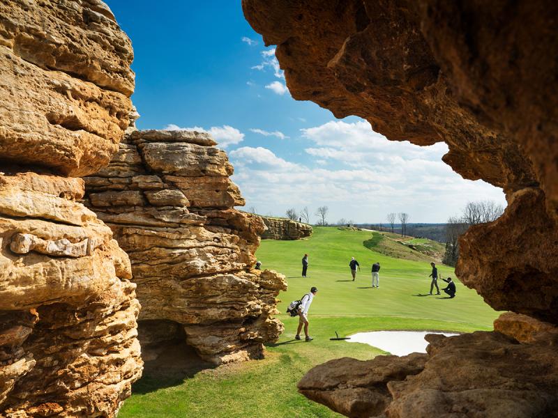 People playing the 13-hole- golf course at Big Cedar's Mountain Top.