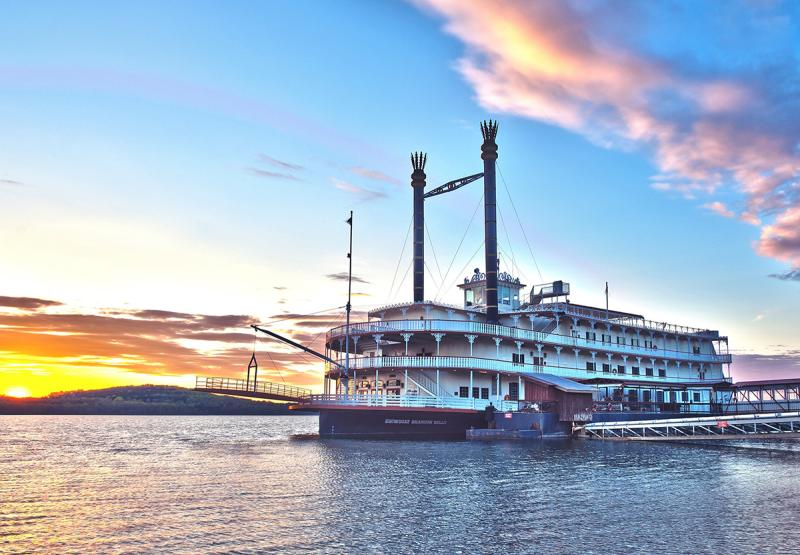 The Showboat Branson Belle waiting at the East Dock at Sunset. 