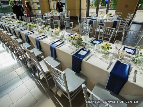 Long table set beautifully at a convention center in downtown Branson.