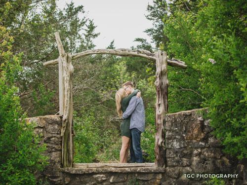 Recently engaged couple kissing at Lakeside Wilderness Area.