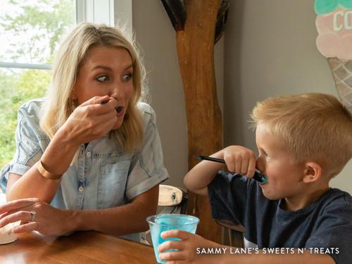Mom and son eating ice cream in Branson.