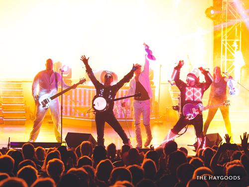 Family band performing on Branson live show stage.