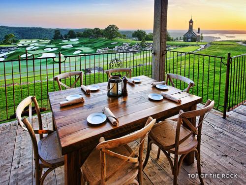 Table and chairs overlooking a famous golf course in Branson.
